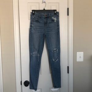 blue high waisted ripped jeans